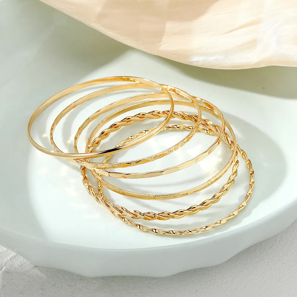 Layered Chain Bracelet Set worn on wrist